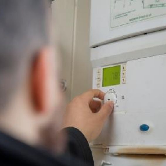 Man fixing boiler