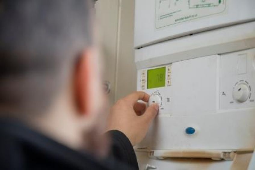 Man fixing boiler